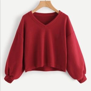 red cropped sweater